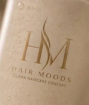Hair Moods logo on a bottle with water droplets